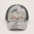 Front view of a custom camo trucker hat with 5 panel cotton front, embroidered logo, curved brim, and mesh back design.