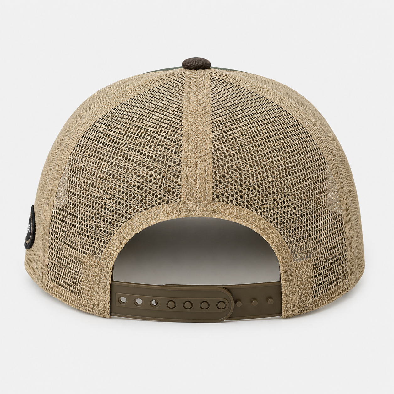 Back view of a breathable mesh trucker hat with an adjustable snapback closure, designed for comfortable daily wear, outdoor use, retail brands, and wholesale customization.