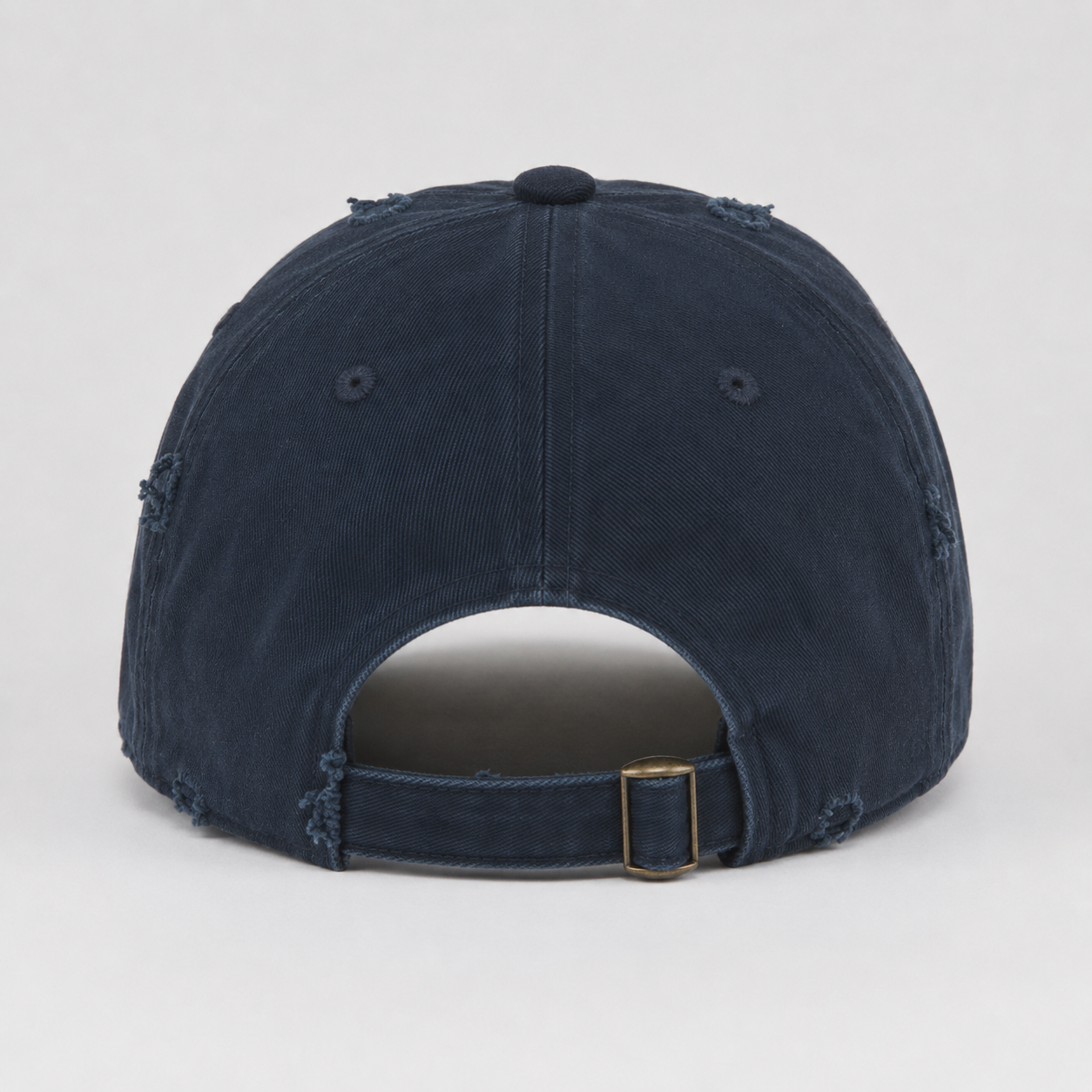 Back view of adjustable washed cotton baseball cap with metal buckle