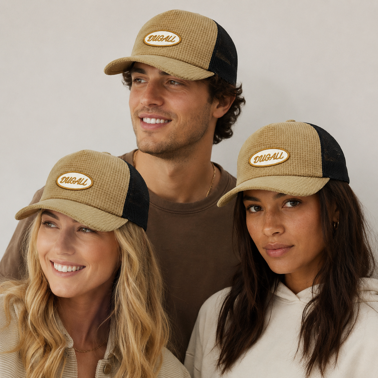 Model wearing display of custom embroidered trucker hats for men and women, designed for fashion brands, outdoor wear, promotional events, retail shops, and wholesale orders.