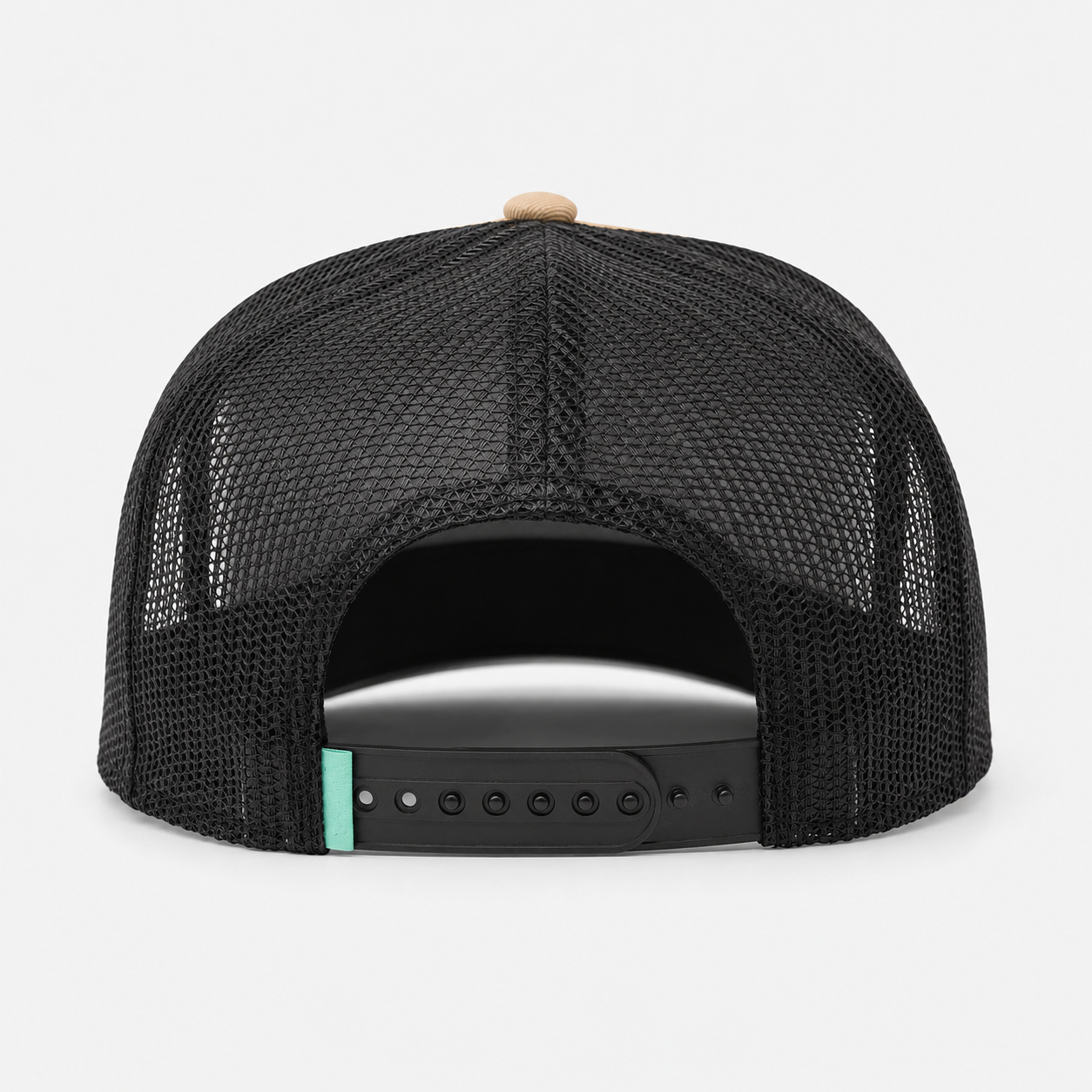 Back view of breathable polyester mesh trucker hat with adjustable snapback closure.