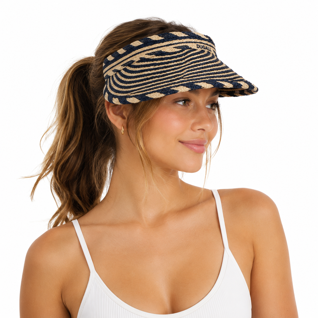 A woman wearing a woven visor hat with a navy and beige pattern, shown from the side against a plain white background.