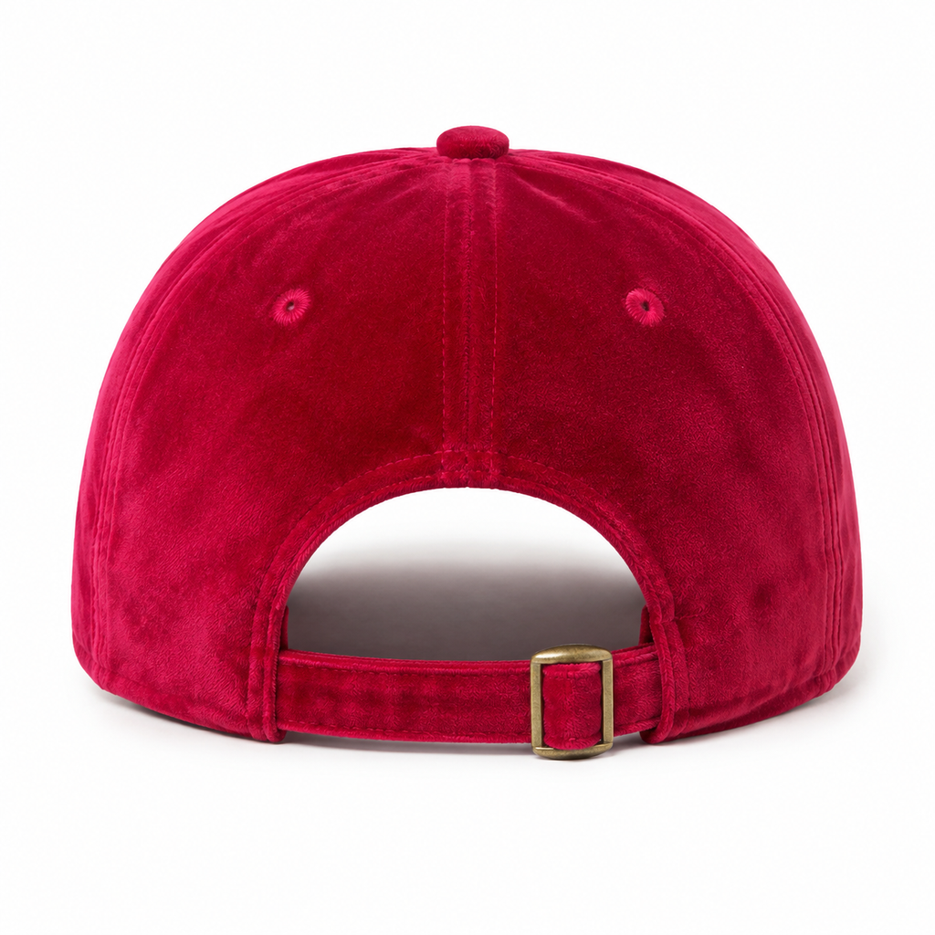 Back view of an adjustable red velvet baseball cap with fabric strap and metal buckle