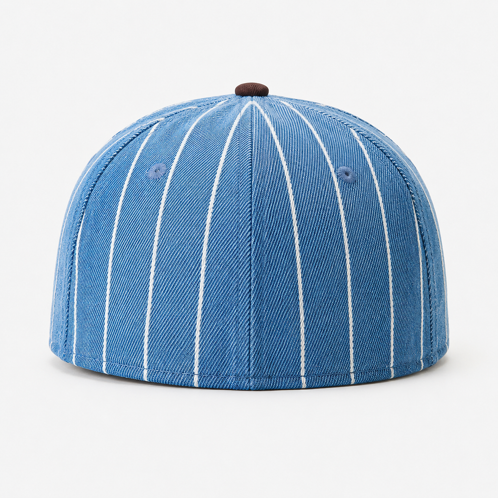 Back view of a blue pinstripe cotton polyester dad hat showing six panel construction and contrast top button.
