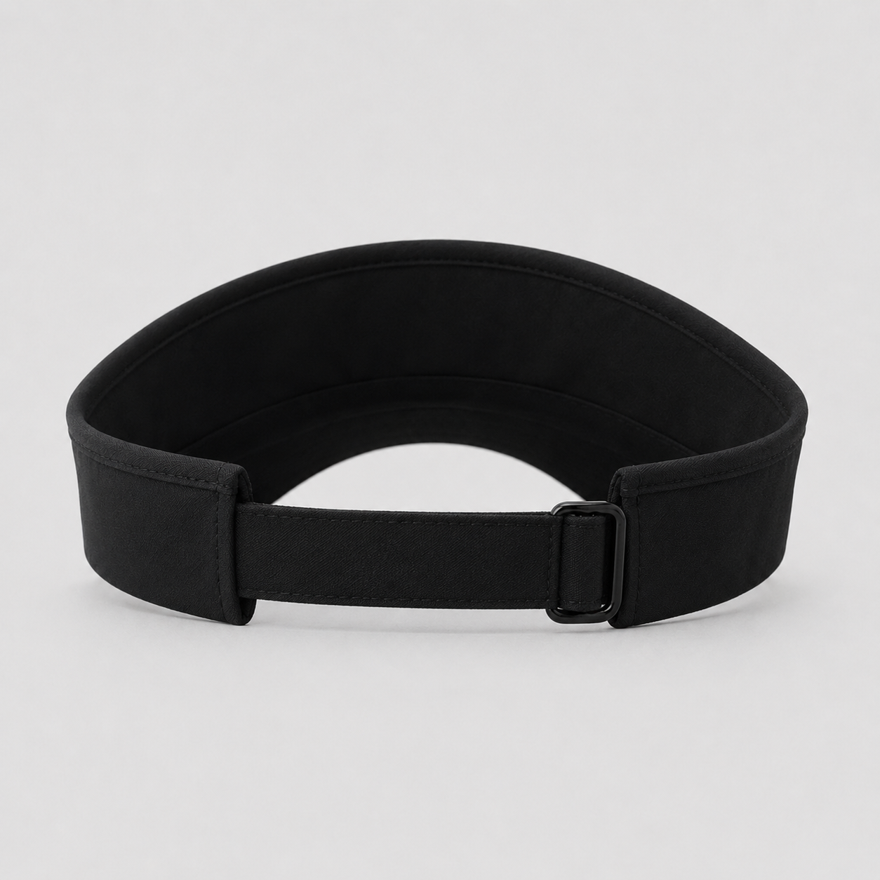 Back view of a black custom sports visor with adjustable strap, designed for sports, golf, and wholesale branding use