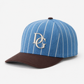 Angled view of a blue pinstripe custom dad hat with brown brim and embroidered logo.