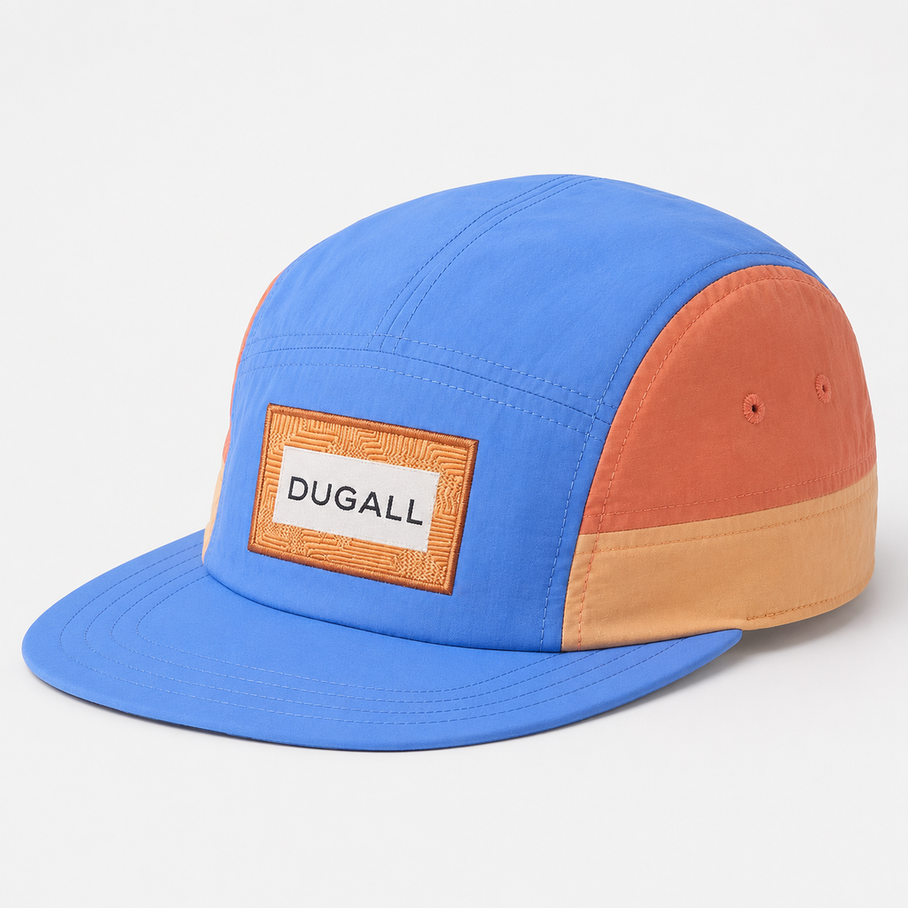 Front view of a custom color block nylon 5 panel baseball cap with patch label logo and flat brim.