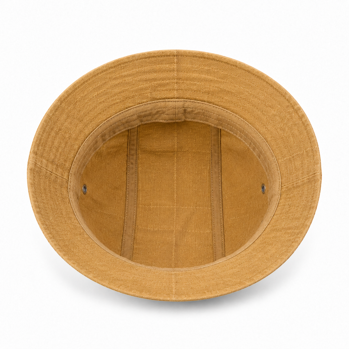 Inside view of a custom cotton linen bucket hat showing the breathable interior construction and soft brim structure.
