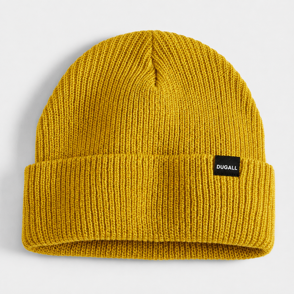 Mustard yellow acrylic ribbed beanie with folded cuff and custom woven label logo.
