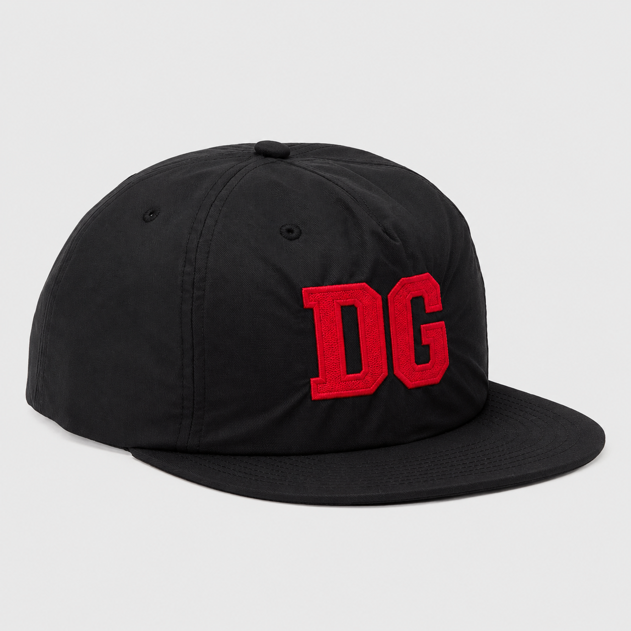 Front view of a black custom nylon snapback hat with red 3D embroidered logo and flat brim.