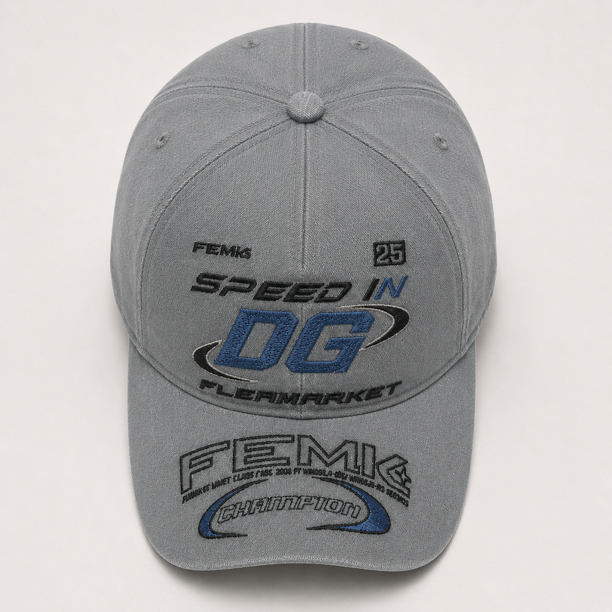Top front view of a custom fashion cotton baseball cap featuring multi-position embroidery and curved brim