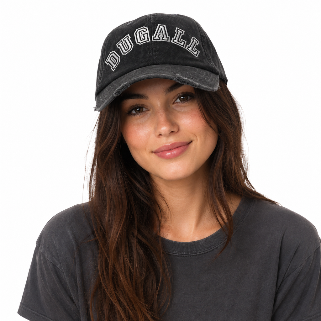 Woman wearing a black washed 100% cotton dad hat with custom embroidered DUGALL logo and distressed curved brim.