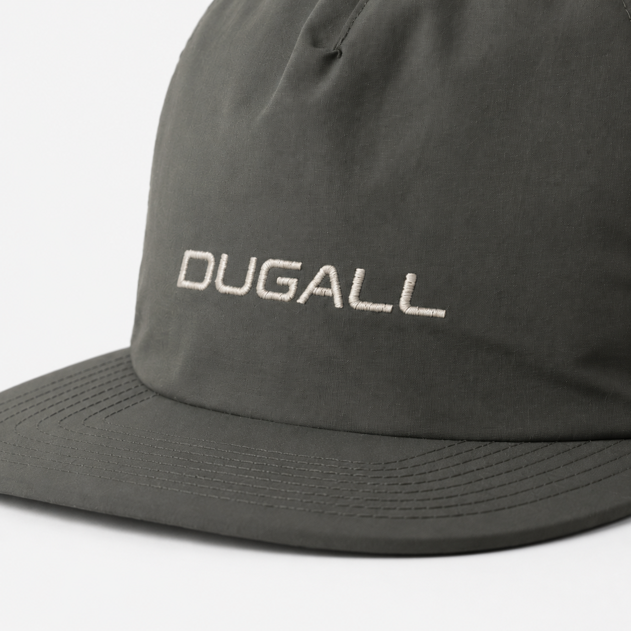Close-up of embroidered DUGALL logo on a custom nylon 5 panel baseball cap
