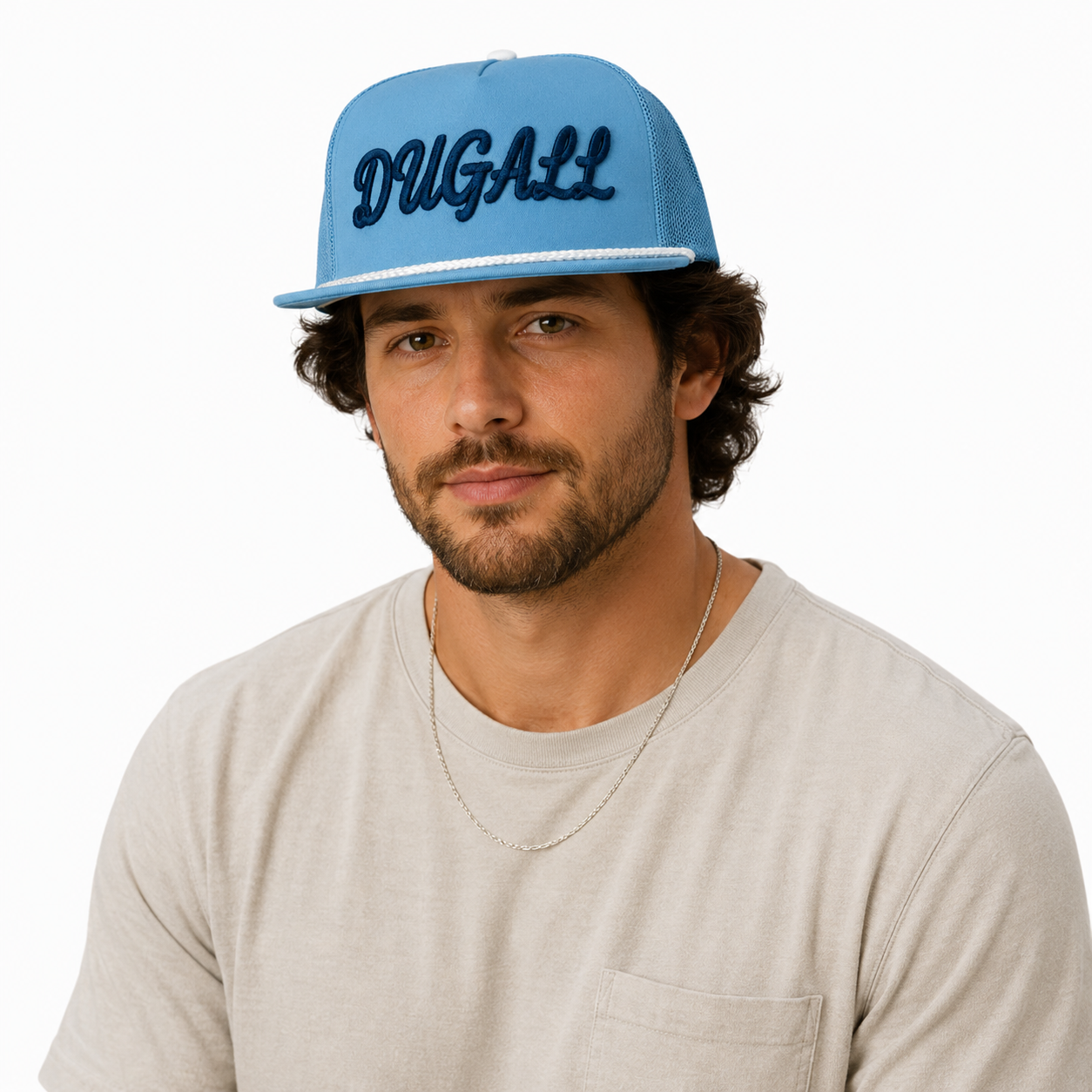 Male model wearing custom blue rope trucker hat with 3D embroidery logo