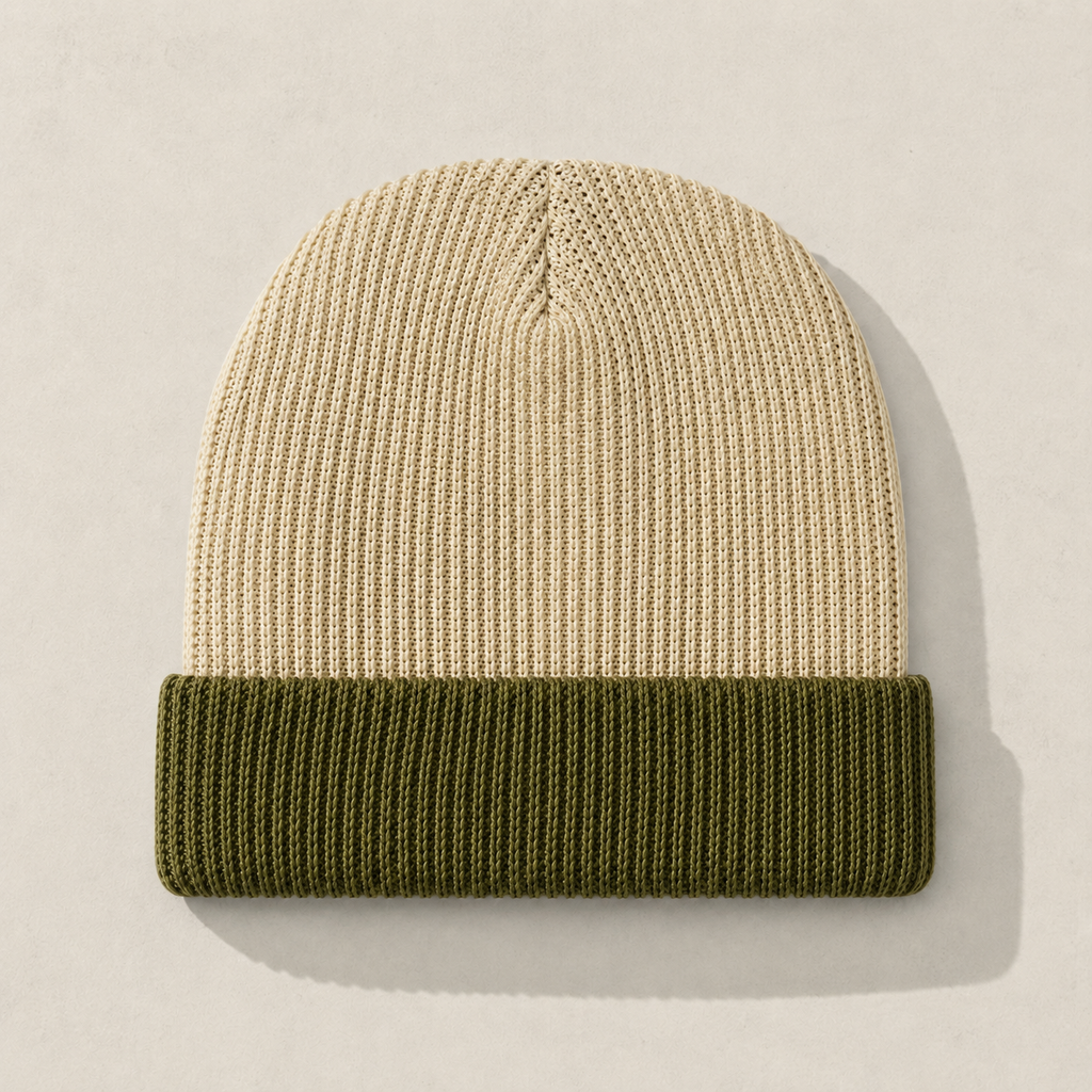 Front flat lay of a blank cream and olive short beanie with clean color block design for custom branding