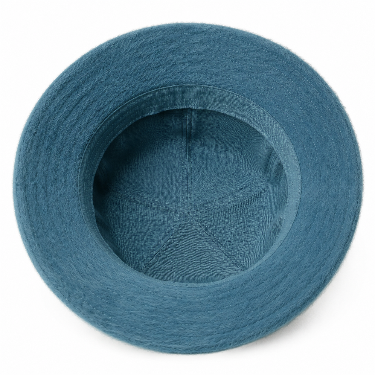 Inside view of a custom faux fur bucket hat showing the inner construction and soft seasonal structure.