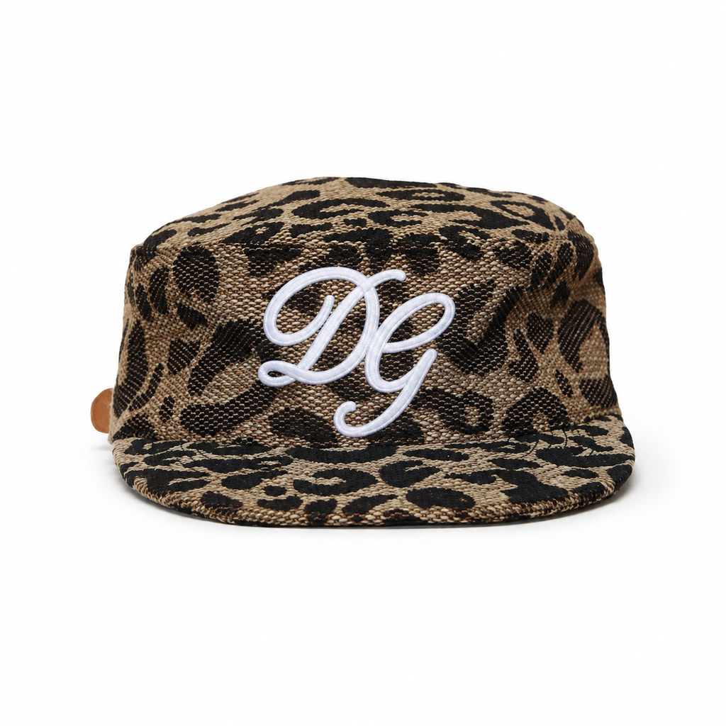 Front view of a custom leopard print flat brim baseball cap with embroidered logo and foam structured body.