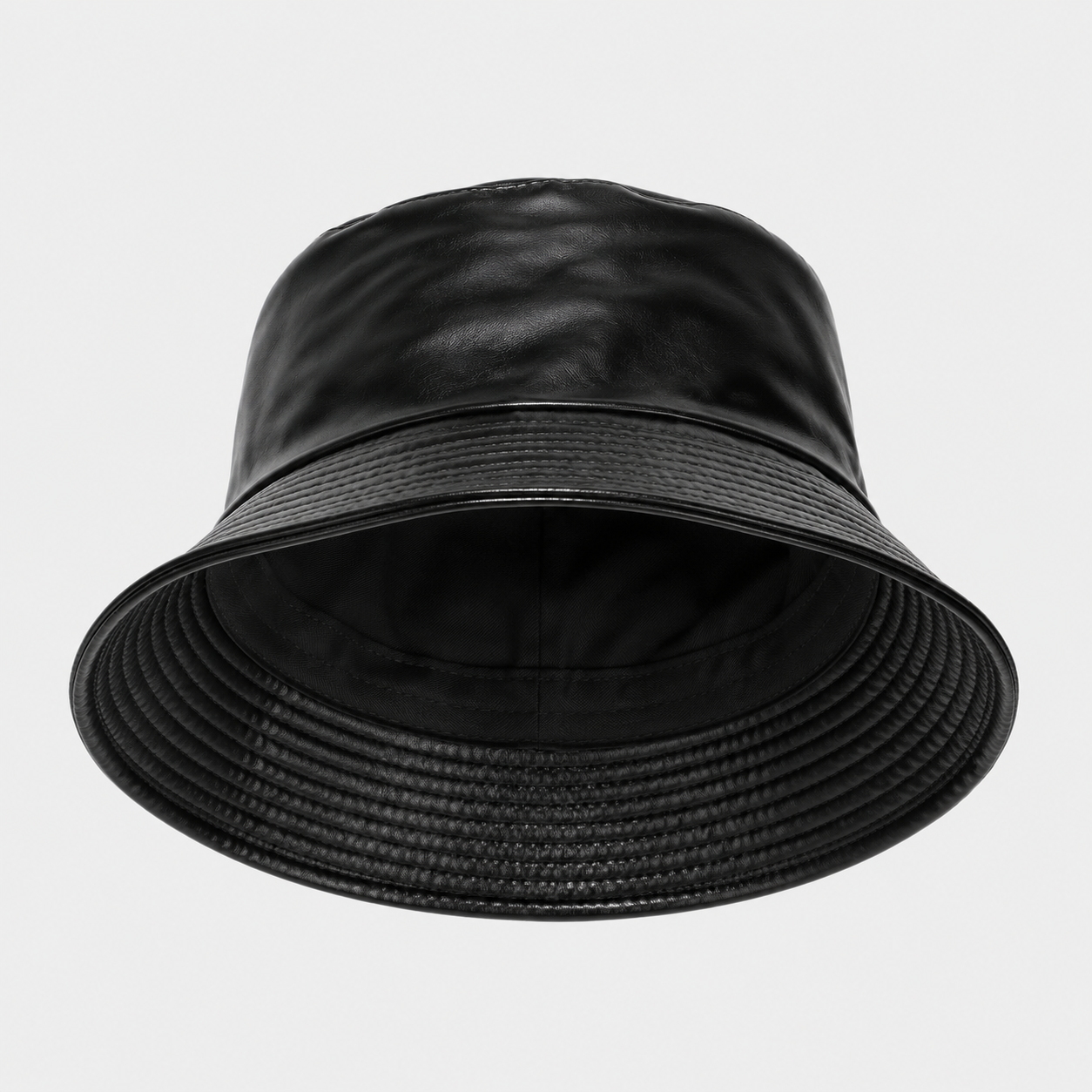 Front view of black PU leather bucket hat with glossy faux leather finish and soft downward brim