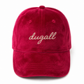 Front view of a high quality custom red velvet six-panel baseball cap with embroidered logo