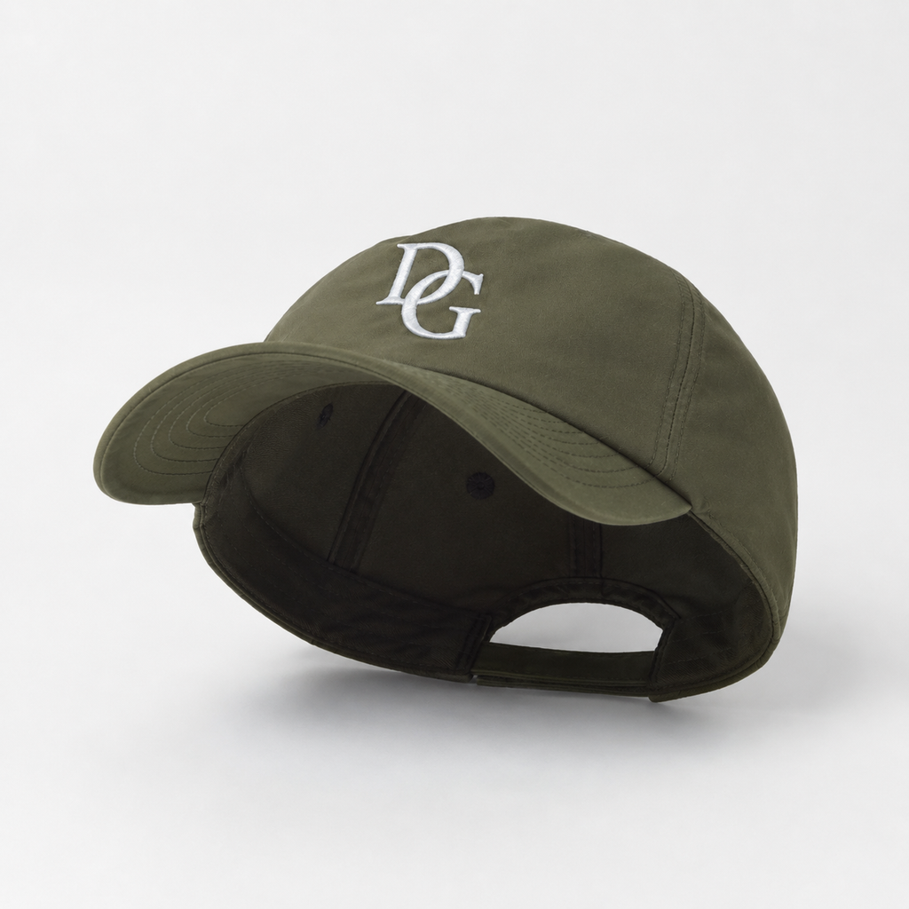 Inside view of an olive cotton twill 5 panel baseball cap showing interior construction, curved brim, and back opening.