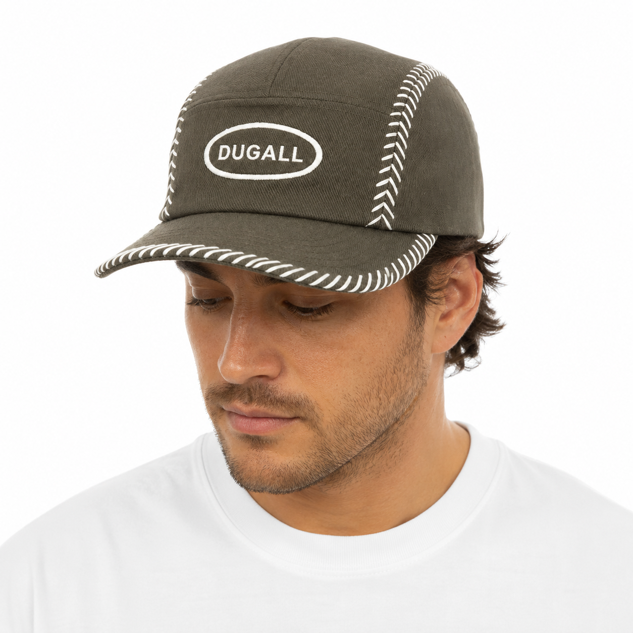 Male model wearing an olive 100% cotton 5 panel cap with custom embroidered logo and baseball stitch design.