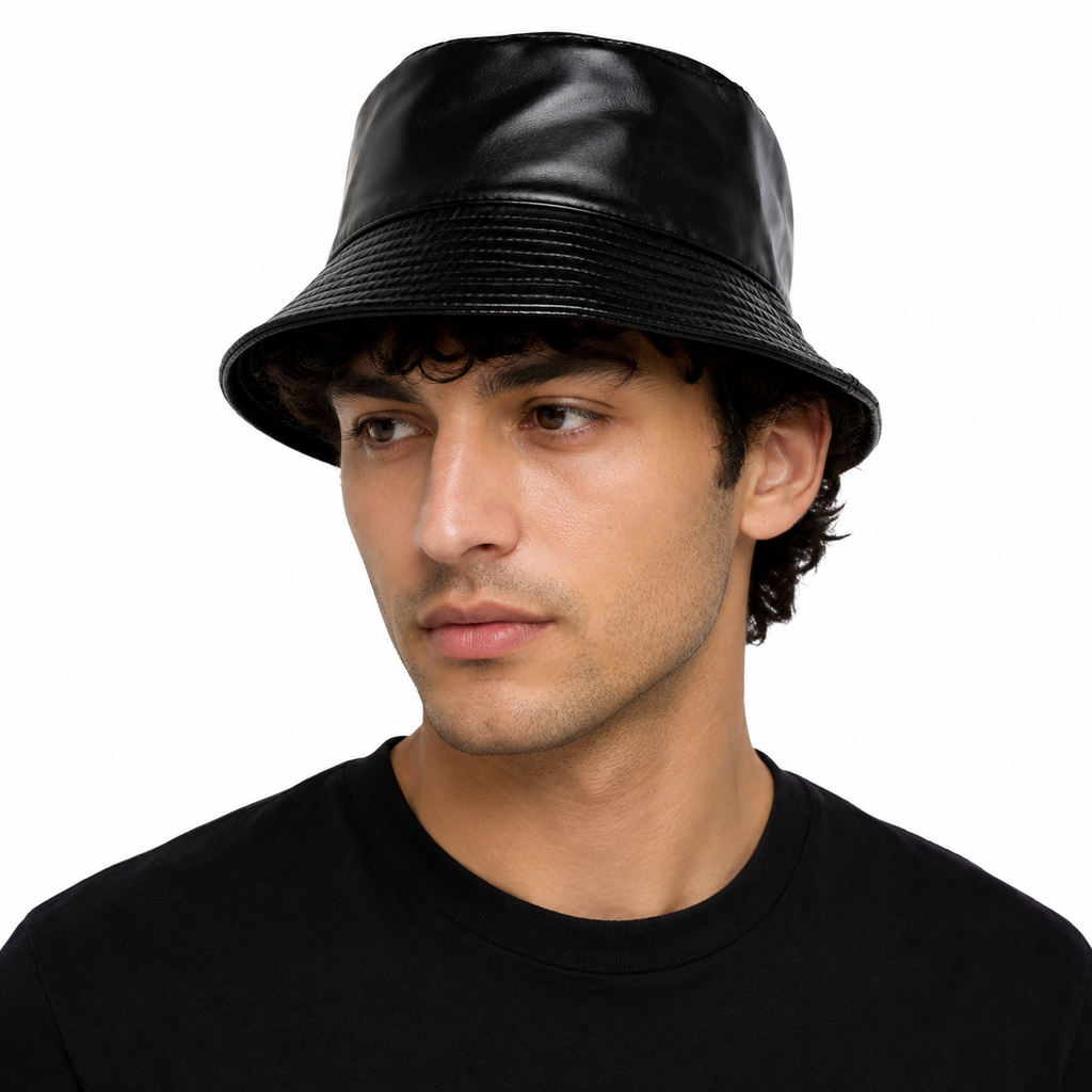 Male model wearing a black PU leather bucket hat with glossy faux leather finish for streetwear and fashion collections