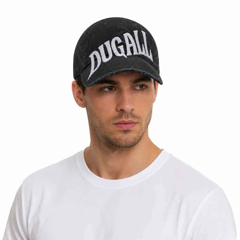 Male model wearing a black custom oversized embroidery snapback hat with large white front logo and vintage distressed brim.