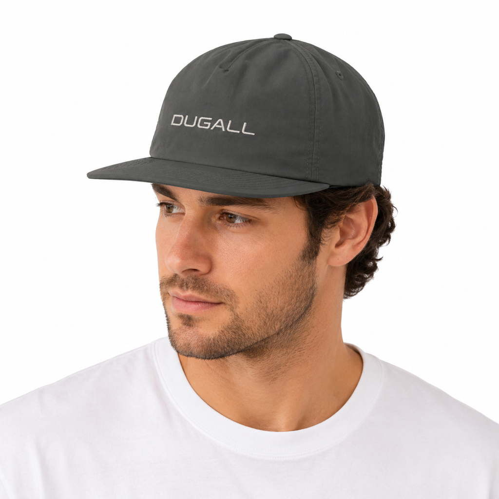 Angled view of a charcoal gray custom nylon 5 panel baseball cap with embroidered logo and flat brim