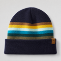 Front view of a custom acrylic ski beanie with retro stripe design, navy cuff, and leather patch logo.