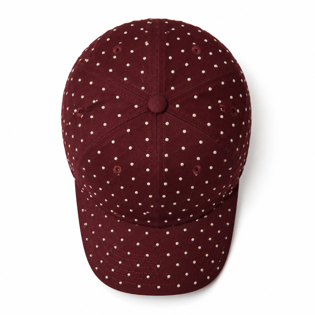Top view of a custom high quality baseball cap featuring rhinestone embellishment and structured 6 panel construction.