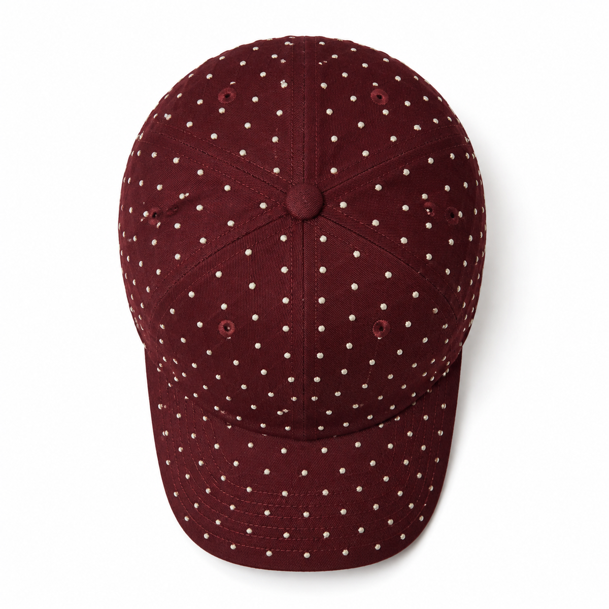 Top view of a custom high quality baseball cap featuring rhinestone embellishment and structured 6 panel construction.