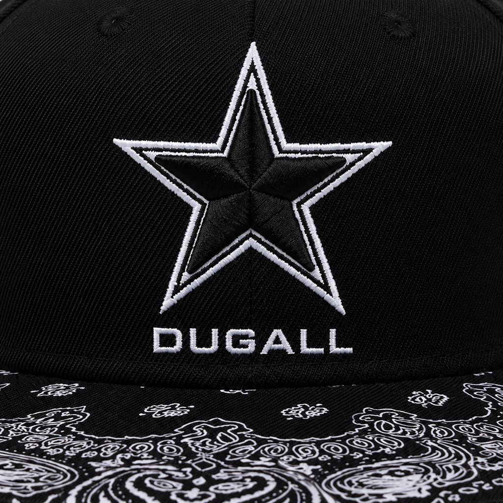 Close-up of embroidered star logo and paisley print brim on a custom black cotton snapback hat