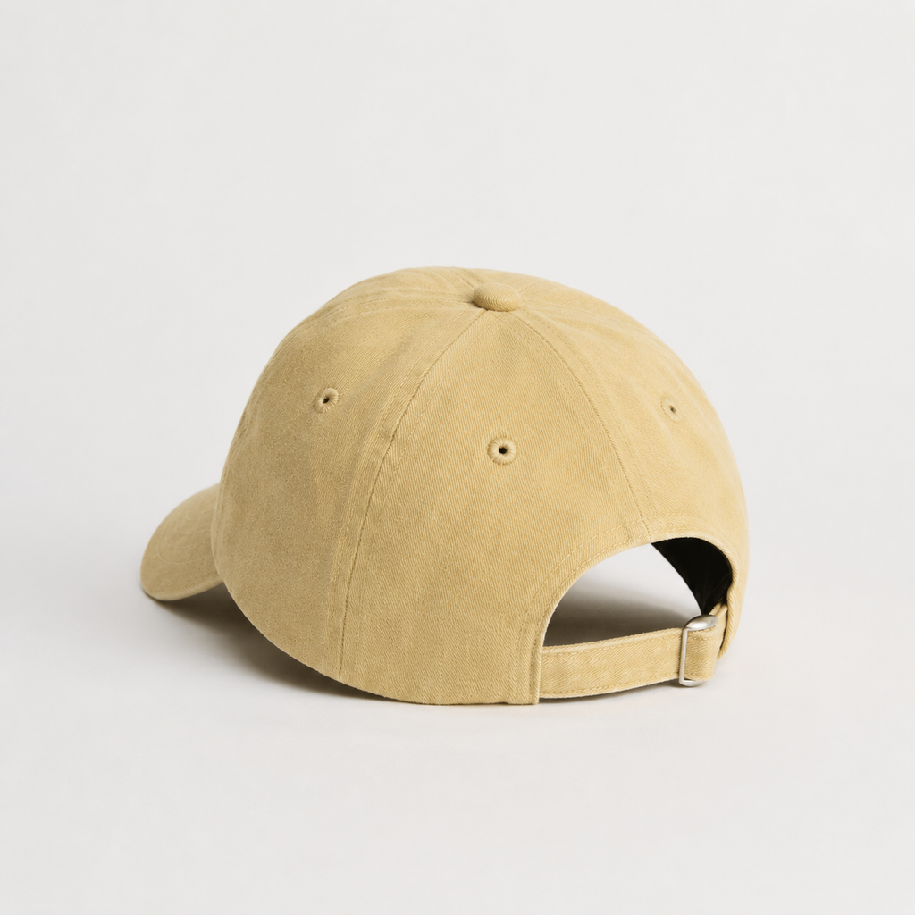 Back view of a beige 100% cotton dad hat with adjustable strapback closure and soft low profile construction