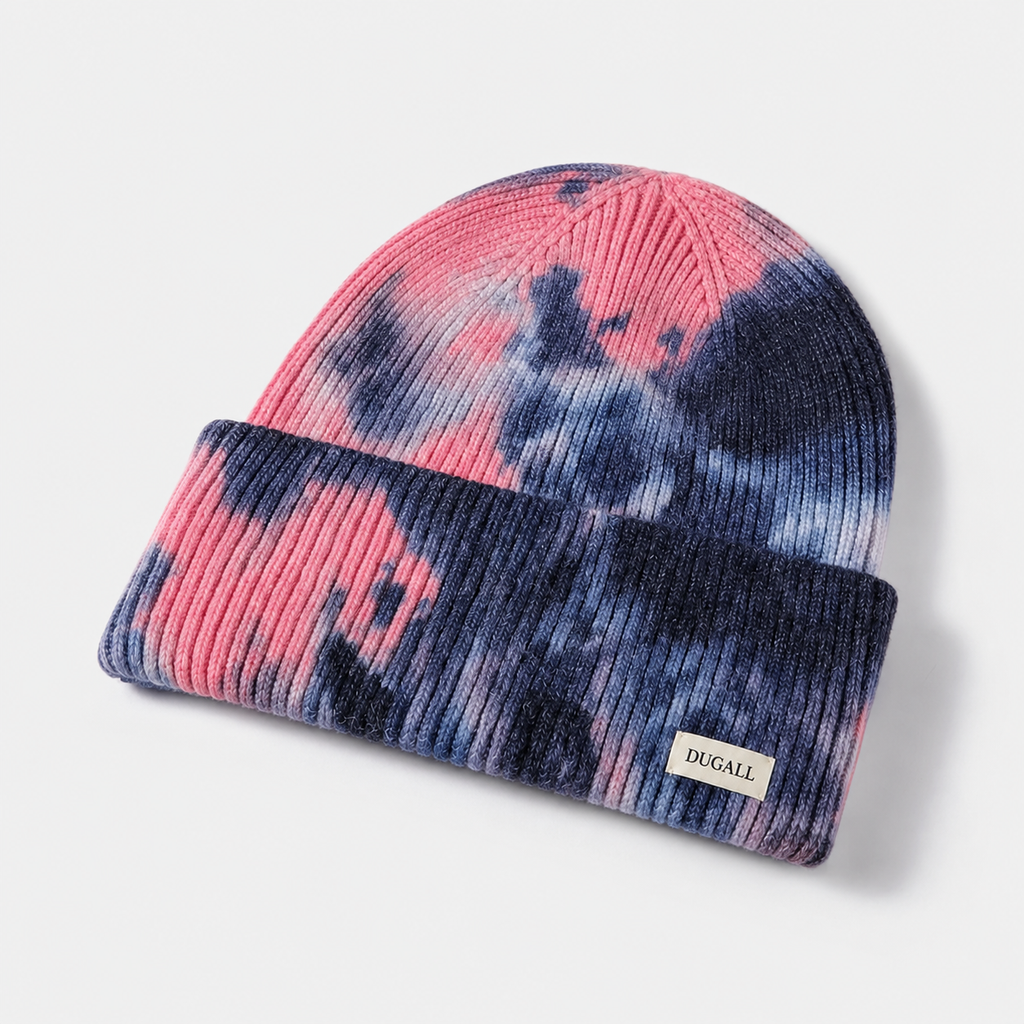 Colorful tie dye acrylic beanie with folded cuff and custom DUGALL logo label.