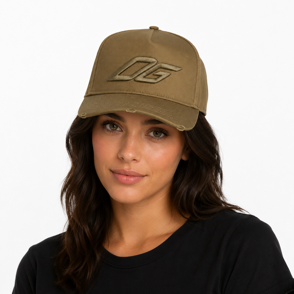 Female model wearing a custom olive snapback hat in a clean fashion look