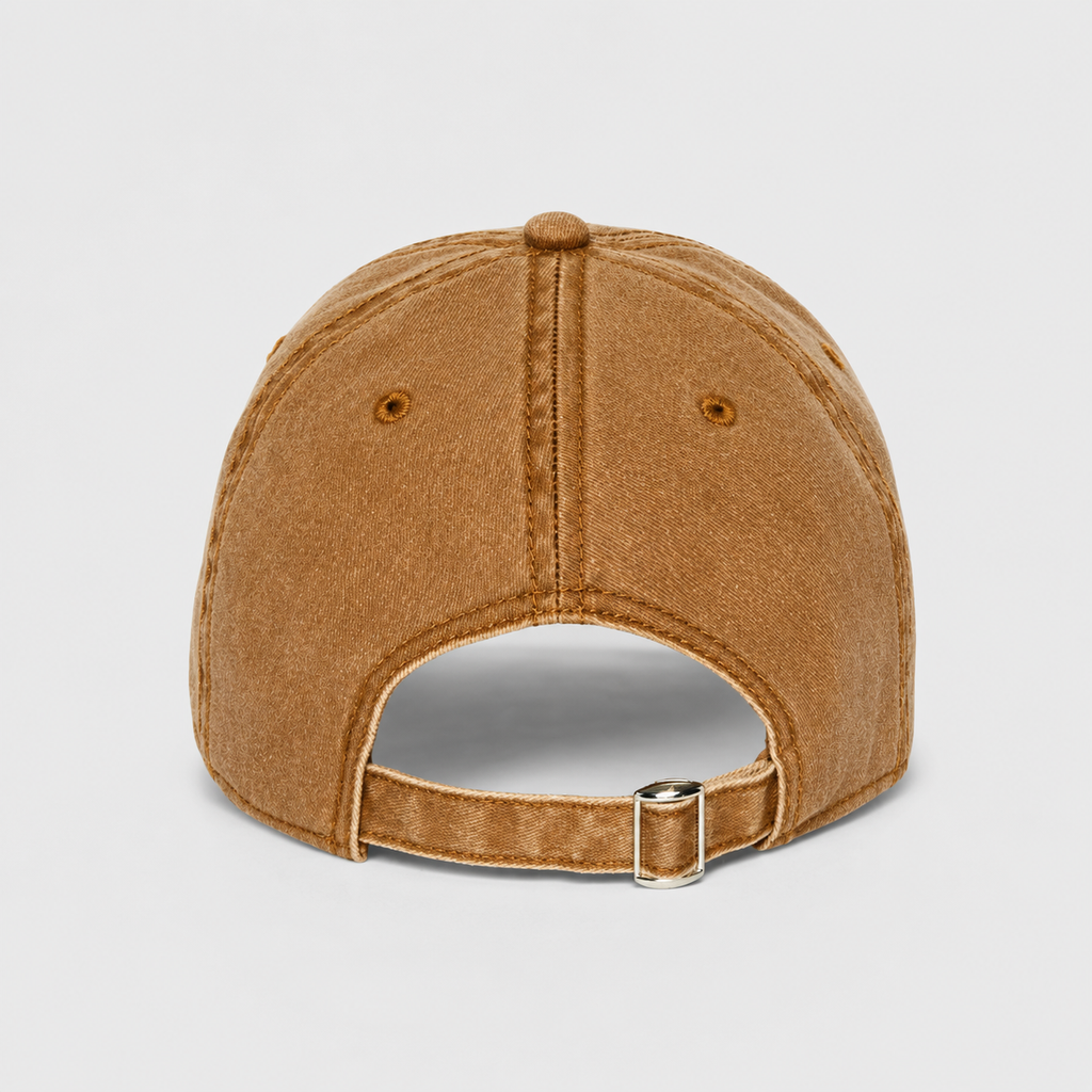 Back view of a honey brown washed cotton dad hat with adjustable strapback and metal buckle closure.