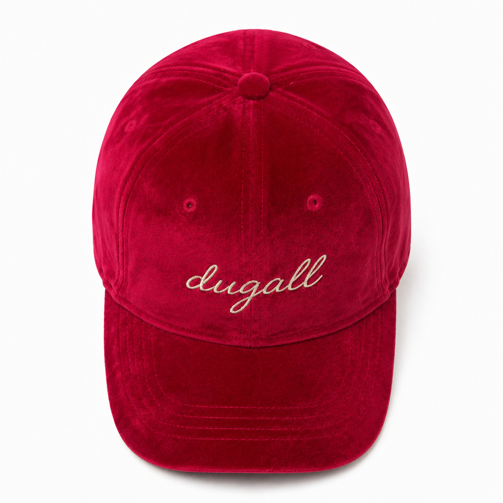 Top view of a wholesale red velvet baseball cap showing its six-panel crown construction
