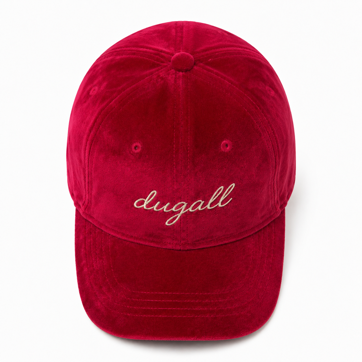 Top view of a wholesale red velvet baseball cap showing its six-panel crown construction