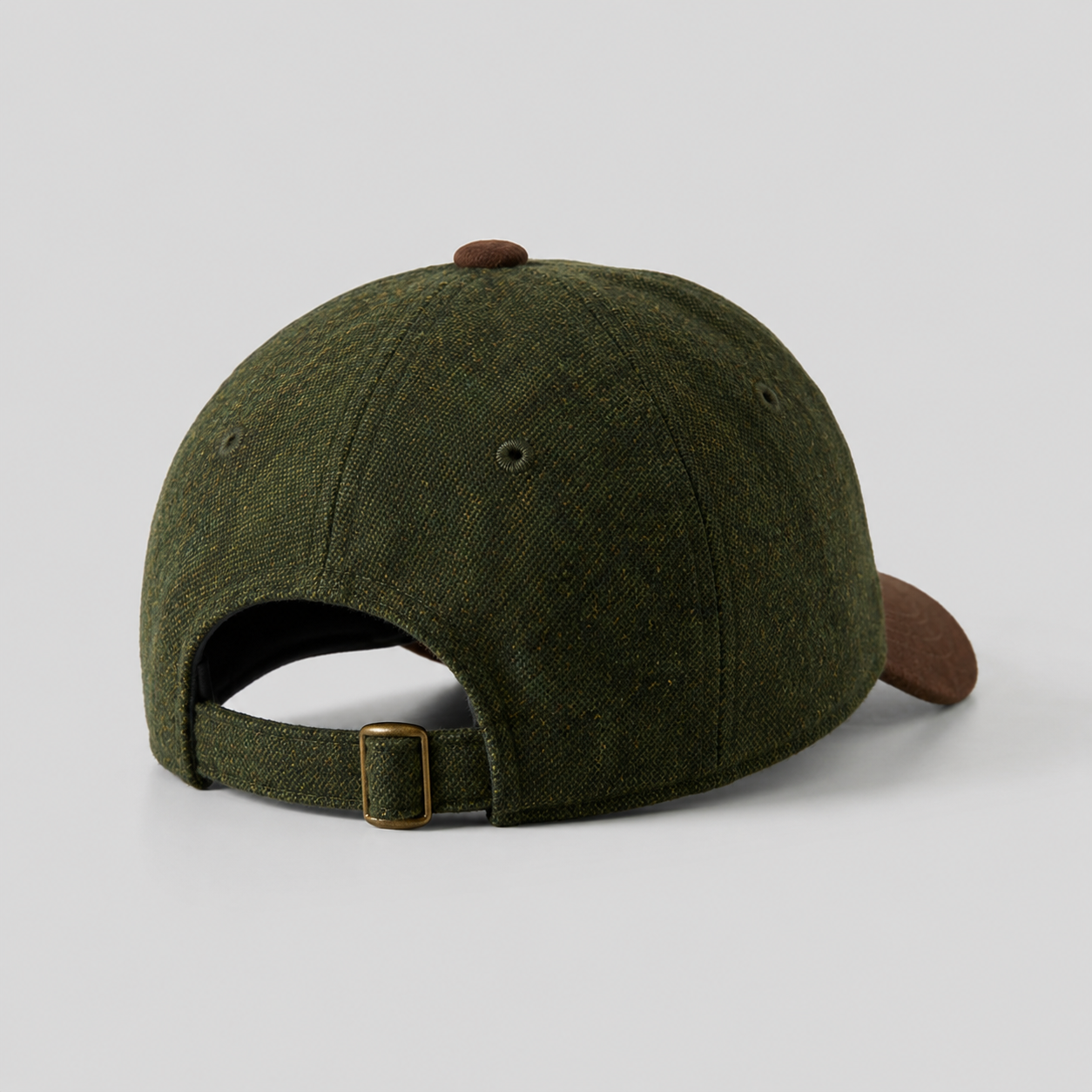 Back view of a wool dad hat with adjustable strapback closure and cotton brim.