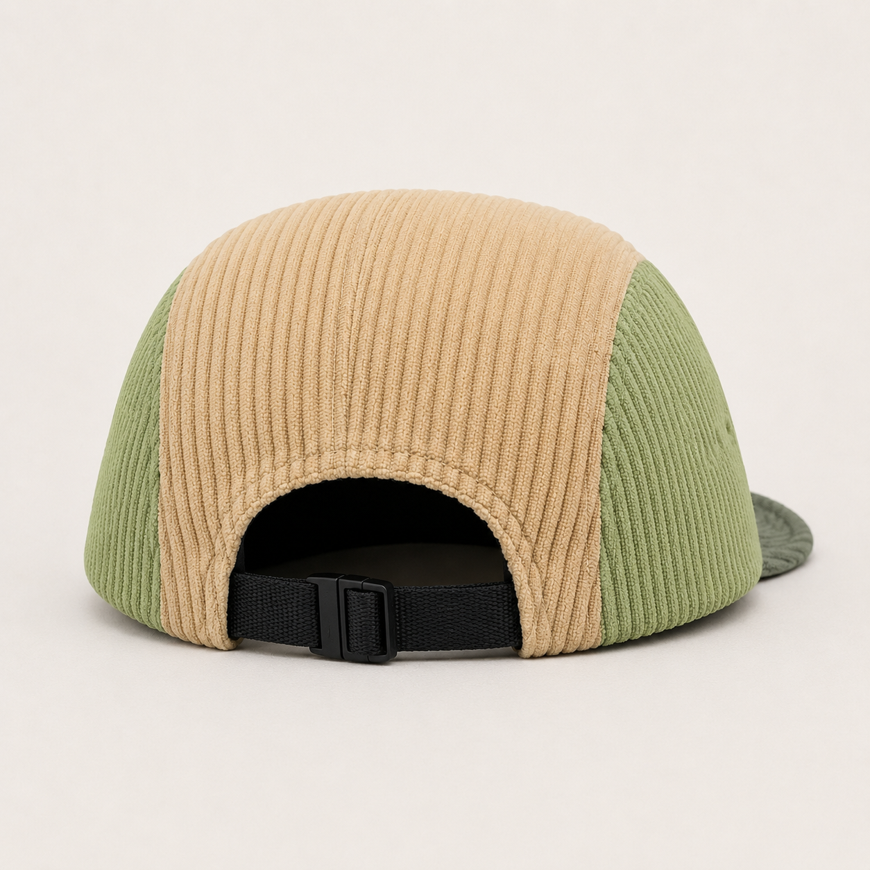 Back view of custom corduroy 5 panel cap with adjustable strap and color block design