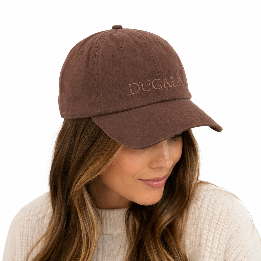 Female model wearing a brown custom cotton snapback hat with tone-on-tone embroidered logo and adjustable fit.