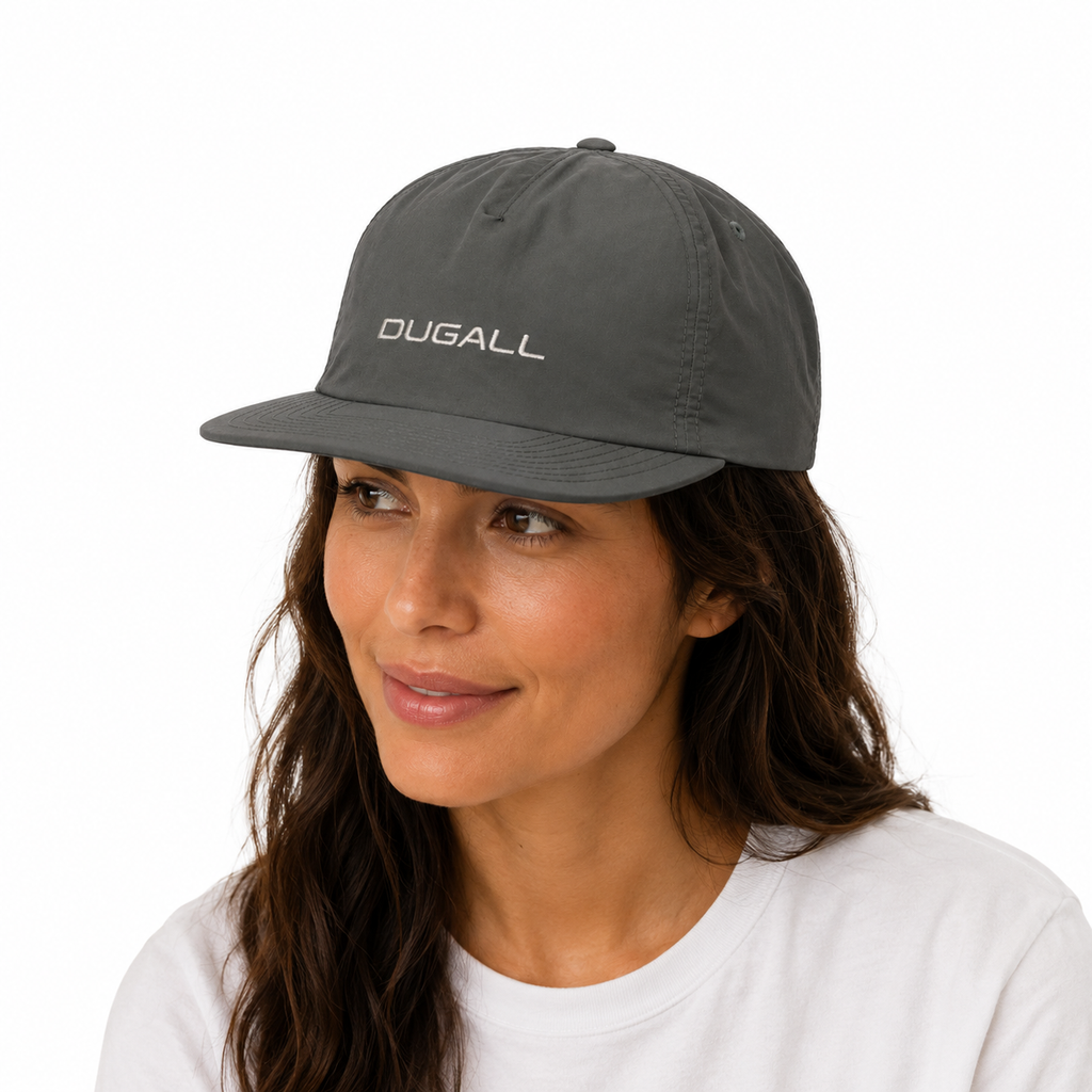 Female model wearing a custom nylon 5 panel baseball cap with embroidered logo in a lightweight outdoor style