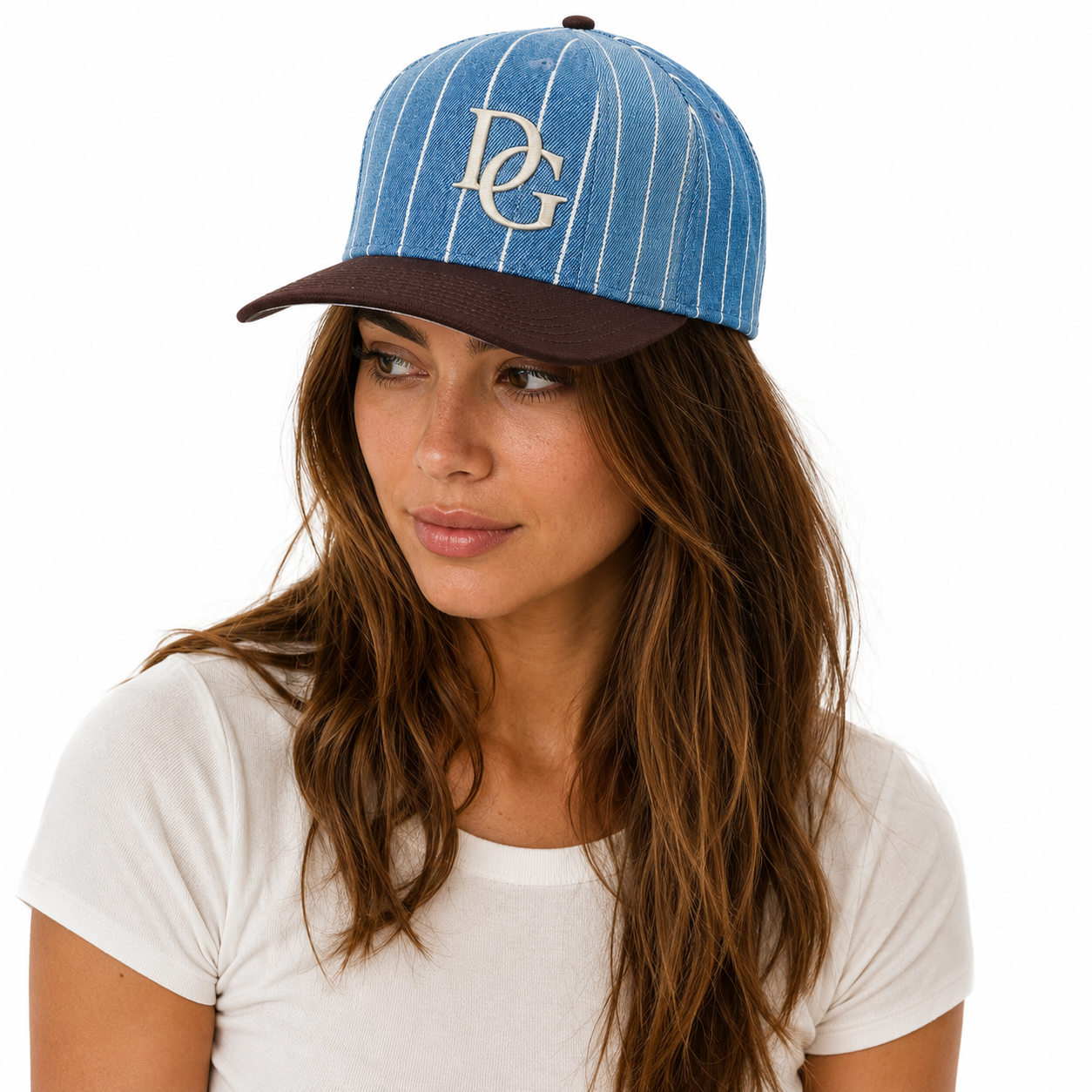 Female model wearing a blue pinstripe custom dad hat with brown curved brim and embroidered logo.